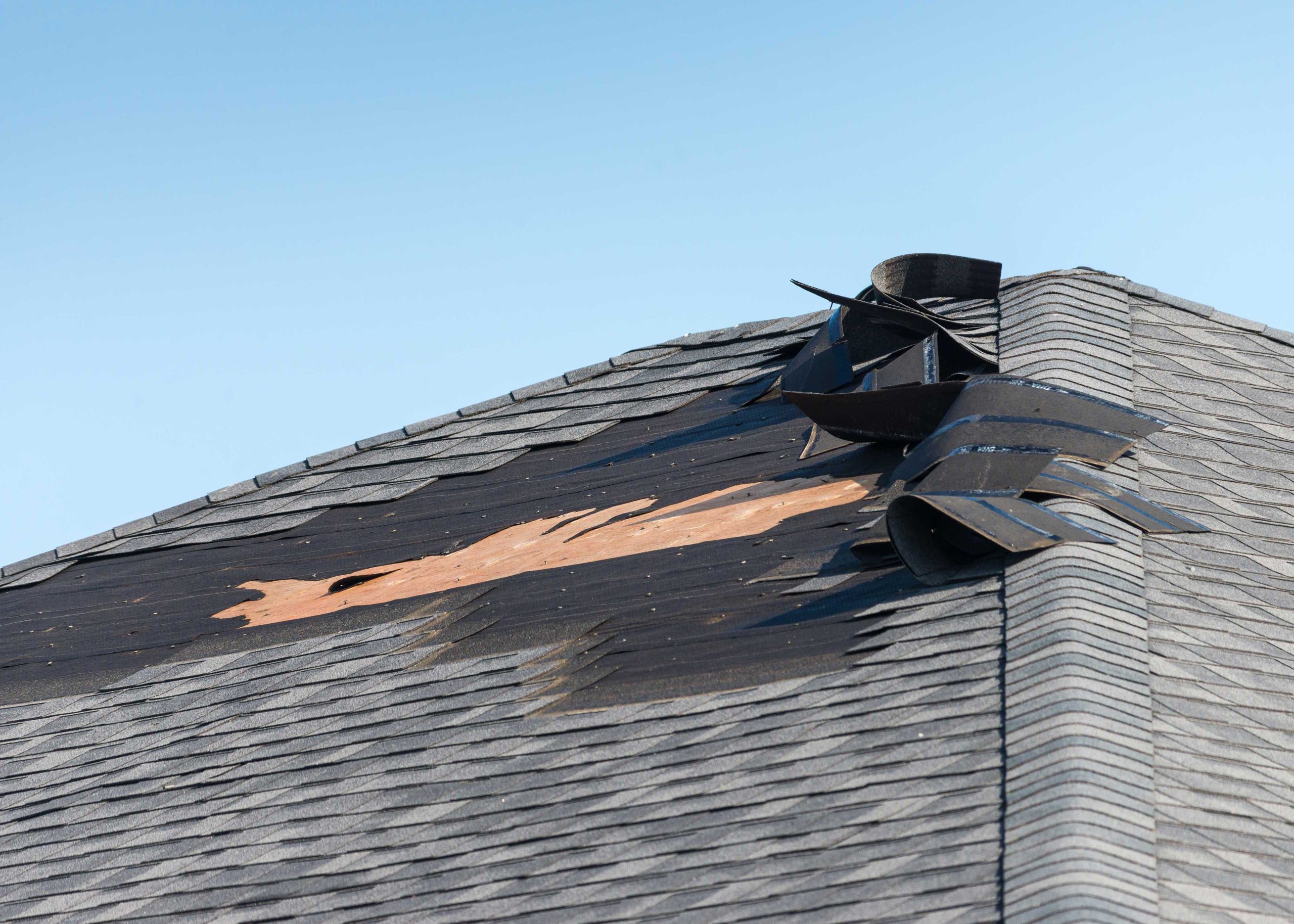 Damage on a roof that a roof repair expert can fix.